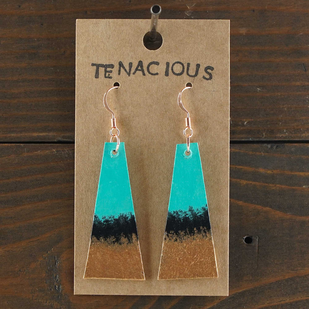 Large, lightweight triangle earrings. Handmade and hand painted in turquoise, black and copper. Made from recycled paper.