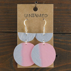 Large, lightweight, geometric earrings. Handmade and hand painted in pink and silver. Made from recycled paper.